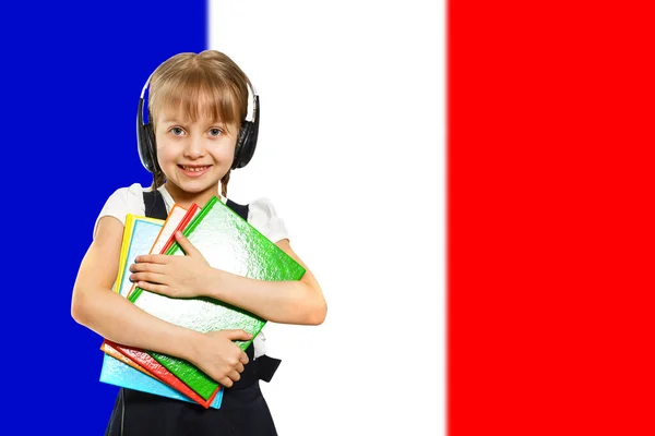 Menina Feliz Segurando Livros Fundo Bandeira França Conceito Aprendizagem Estudo — Fotografia de Stock