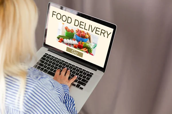 Close up woman sitting and orde food online on laptop computer in add to cart function webpage at coffee shop,Digital marketing concept.digital lifestyle living — Stock Photo, Image