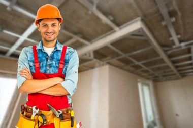 İnşaat aletleri ile tamirci. Ev yenileme arkaplanı.