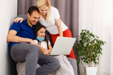 Work from home or Stay at home from Coronavirus Covid-19 pandemic crisis. Lifestyle happy Family time at home with laptop. Quarantine. clipart