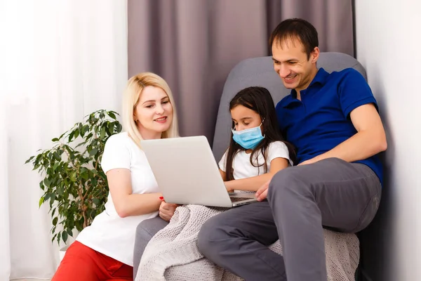 Work from home or Stay at home from Coronavirus Covid-19 pandemic crisis. Lifestyle happy Family time at home with laptop. Quarantine.