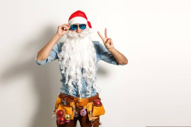 İnşaat aletleriyle Noel Baba, Noel Baba tamircisi.