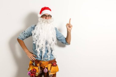 İnşaat aletleriyle Noel Baba, Noel Baba tamircisi.