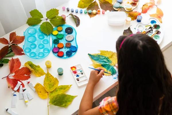 Little Girl Paints Leaves Brush Home Autumn Art — Stock Photo, Image