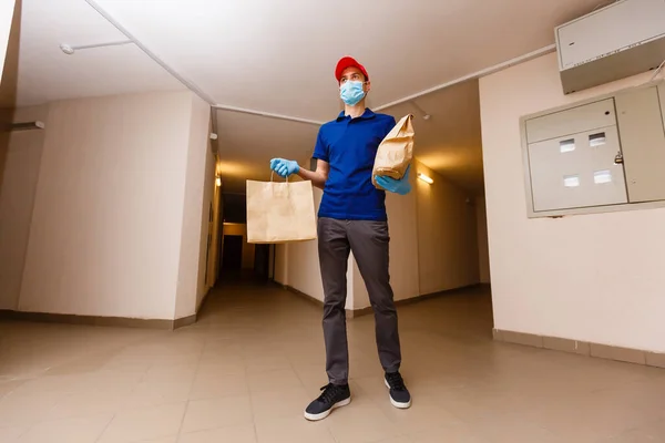 Delivery Man Holding Cardboard Boxes Rubber Gloves Mask Online Shopping — Stock Photo, Image