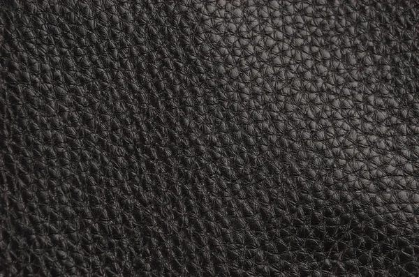自然的黑色皮革背景的特写 — 图库照片