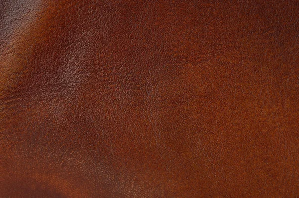 自然な茶色の革の背景のクローズアップ — ストック写真