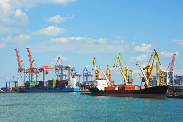 Bulk cargo ship under port crane bridge, Odessa, Ukraine