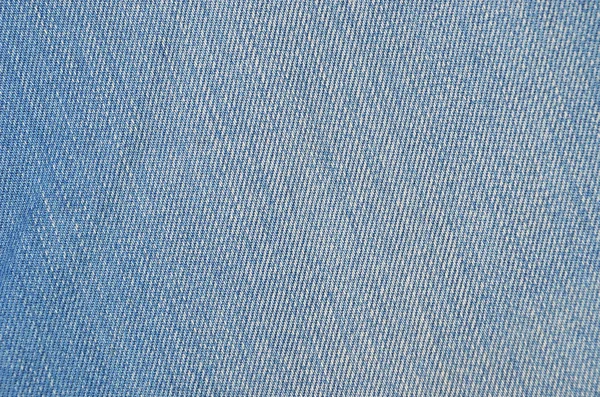 テクスチャ ジーンズ生地布繊維の背景のクローズ アップ — ストック写真