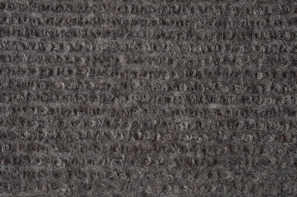 Zbliżenie Teksturowanego Dywanu Syntetycznego Jako Tła — Zdjęcie stockowe