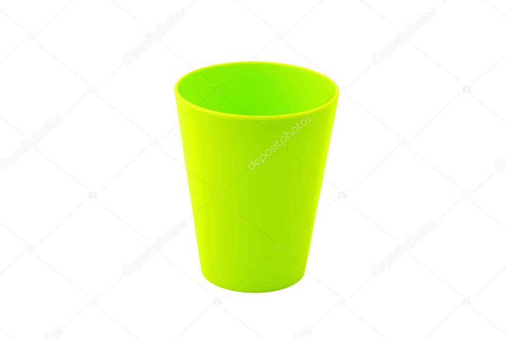 Green plastic cup, isolated on white background