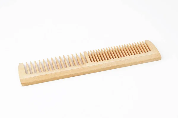 stock image Wooden rake-comb on white