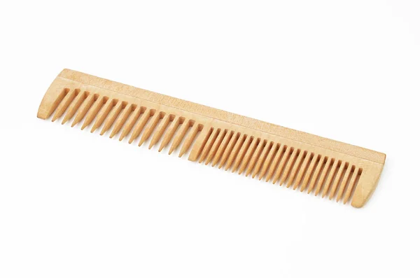 Wooden rake-comb on white — Stock Photo, Image