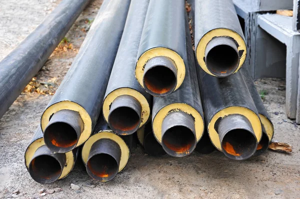 Rusty steel pipe with heat insulation — Stock Photo, Image