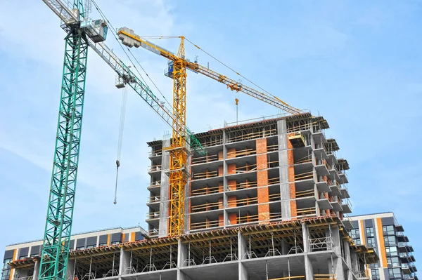 Crane and highrise construction site — Stock Photo, Image