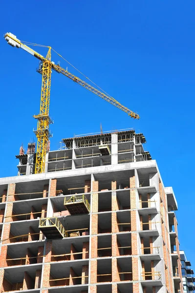 Crane and highrise construction site — Stock Photo, Image