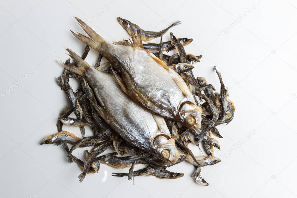 Dried dried fish on a gray background
