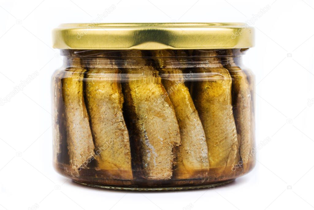 Glass jar of sprats on a white background isolate