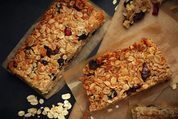Top View Homemade Granola Bars Nuts Cranberries Black Background — Stock Photo, Image