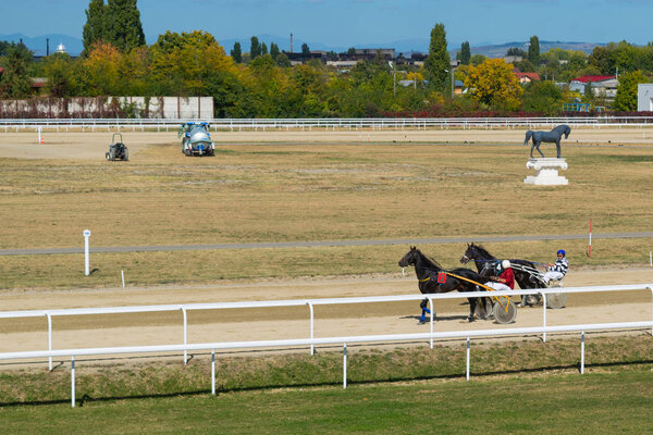 Ploiesti, Romania - October 07, 2018: A trotting horse race held on Ploiesti Hippodrome in Prahova, Romania