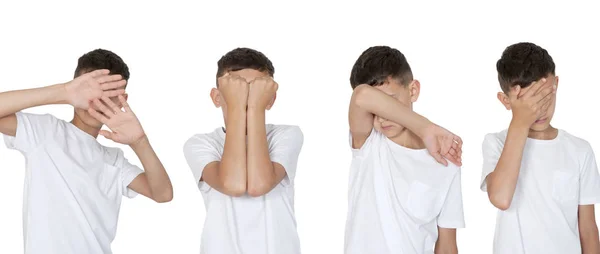 teenage boy hide his face with his hands on a white background