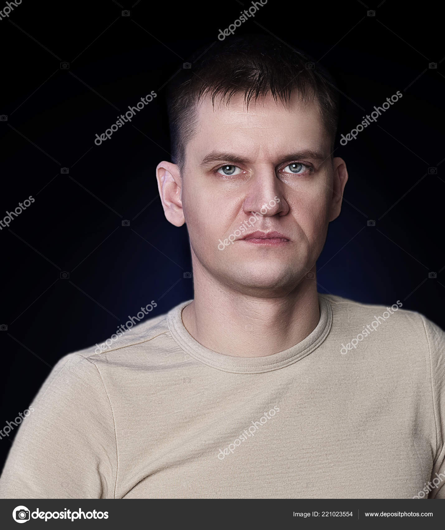 Portrait Courageous Young Man Short Haircut Black Background Light