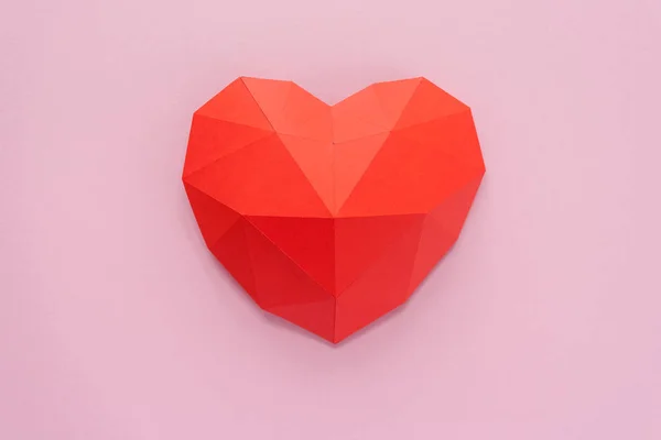 Paper hearth with shadow. Red polygonal paper heart