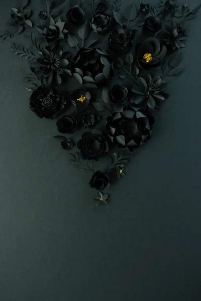 Zwarte papieren bloemen op zwarte achtergrond. Gesneden uit papier. — Stockfoto