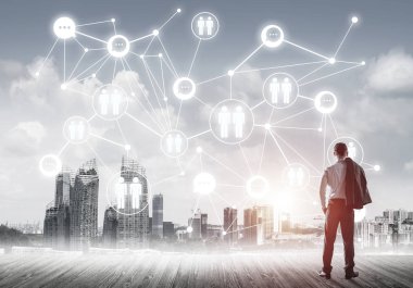 Modern şehir manzarası ve bağlantı konseptine bakan işadamlarının arka planı