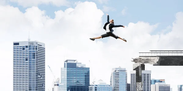 Business Woman Jumping Huge Gap Concrete Bridge Symbol Overcoming Challenges — Stock Photo, Image