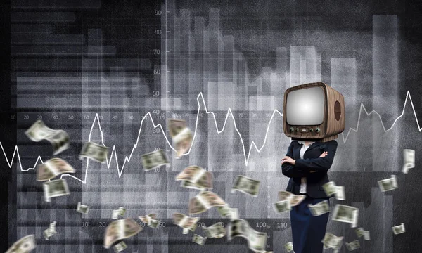 Business woman in suit with old TV instead of head keeping arms crossed while standing against flying dollar banknotes and analytical charts drawn on wall on background. 3D rendering.