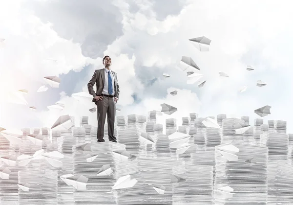 Confident Businessman Suit Standing Flying Paper Planes Looking Away Cloudly — Stock Photo, Image