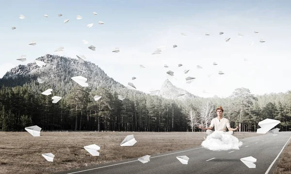 Young Man Keeping Eyes Closed Looking Concentrated While Meditating Cloud — Stock Photo, Image