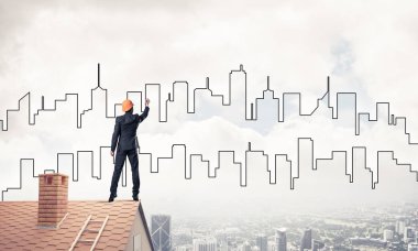 Mühendis, evinin çatısına geri döndü ve şehri çiziyor. Karışık ortam