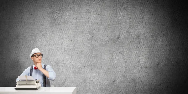 Young Man Writer Hat Eyeglasses Using Typing Machine While Sitting — Stock Photo, Image