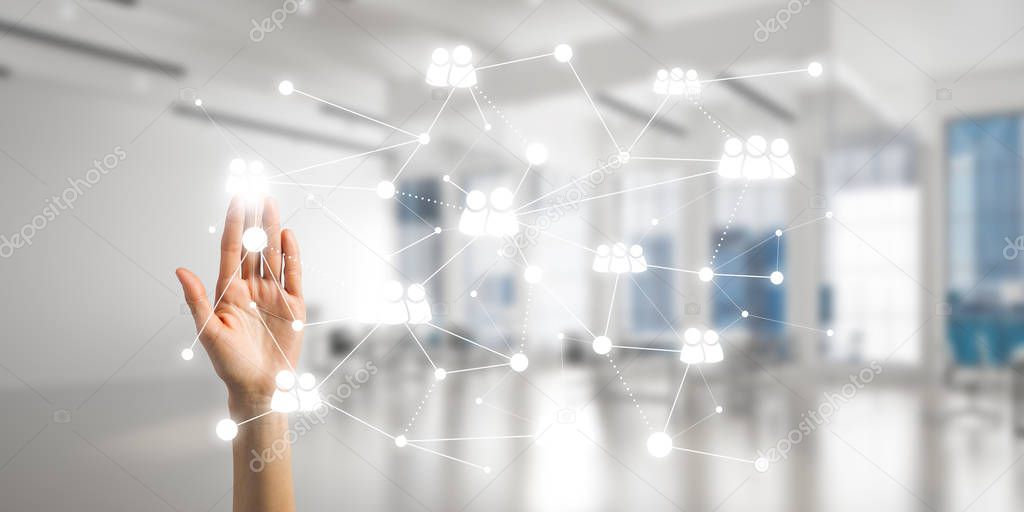 Close up of businesswoman hand touching network concept on screen