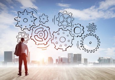 Ekip çalışması ve işbirliği sembolü olarak ekranda çarklı motor çizildi