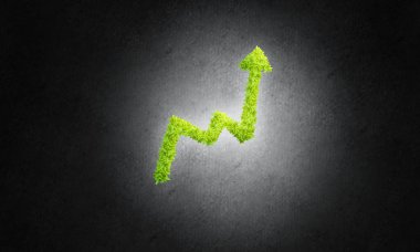 Yakın yeşil grafik ilerleme ve gelir sembolü olarak büyüyen