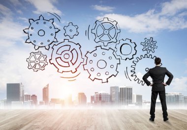 Ekip çalışması ve işbirliği sembolü olarak ekranda çarklı motor çizildi