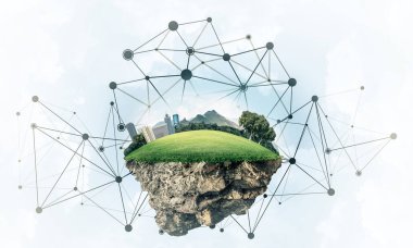 Gökyüzünde yükselen çimen ve şehir manzaralı güzel küçük bir ada.