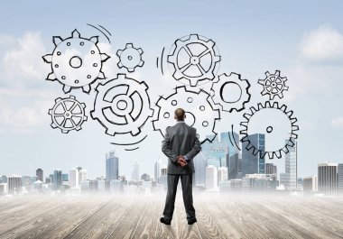 Ekip çalışması ve işbirliği sembolü olarak ekranda çarklı motor çizildi