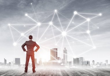 İşadamı arkasını kolluyor ve ağ çizimi kavramına bakıyor