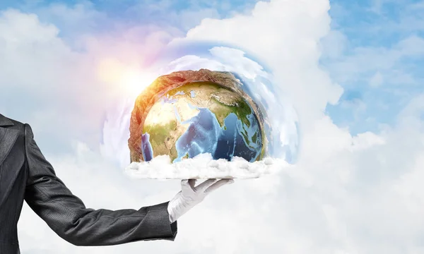 Cropped image of waitress\'s hand in white glove presenting Earth globe on metal tray with cloudy skyscape on background. 3D rendering. Elements of this image are furnished by NASA.