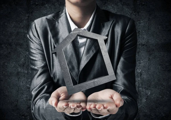 Closeup Businessman Black Suit Keeping Stone House Symbol Hands Dark — Stock Photo, Image