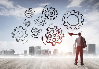 Modern şehre bakan ve vites düzeneği çizen işadamlarının arka planı