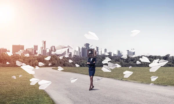 Business woman with old TV instead of head.