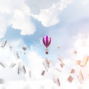 Renkli aerostats kağıt belgeler arasında ve mavi bulutlu gökyüzü üzerinde uçan. 3D render.