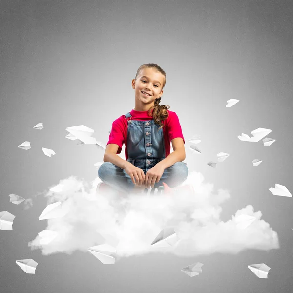 Concept of careless happy childhood with girl dreaming about something — Stock Photo, Image