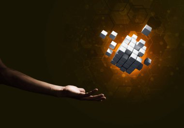 Yeniliğin sembolü olarak insan eli küp figürüne yakın olmak. Karışık ortam.