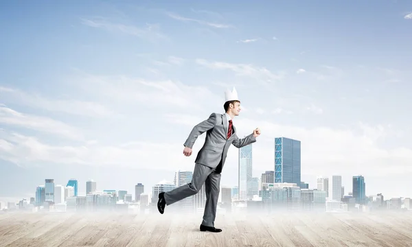 Young Handsome Businessman Wearing White Paper Crown Running Hurry — Stock Photo, Image